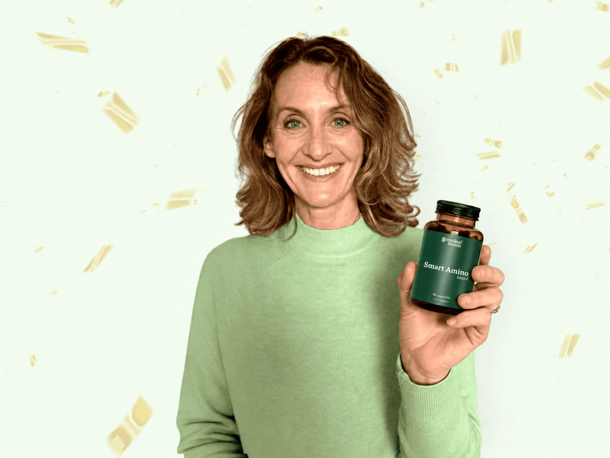 Greenleaf brand photograph of a woman holding a supplement bottle